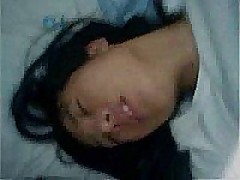 Grainy, shaky and noisy mobile phone video of Korean non-professional teen Hye Jin taking her older lovers cock in her hairy pussy and riding him into oblivion while carrying out all precautions proscribed by safe sex regulations.